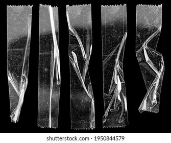 set of transparent adhesive tape or strips isolated on black background with nice light reflection, crumpled plastic sticky snips, poster design overlays or elements.