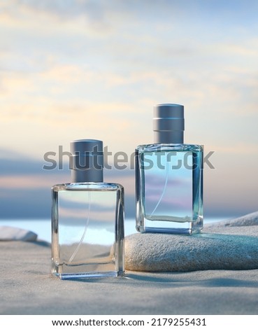 Set of transparent glass bottles for perfume and cologne