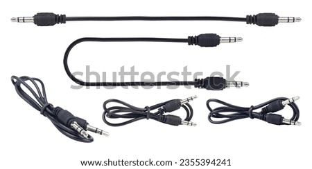 set, TRRS audio jack, aux cable isolated from background	