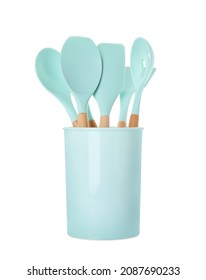 Set of turquoise kitchen utensils in holder isolated on white
