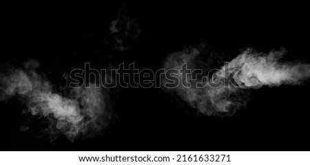 A set of two different horizontal swirling, wriggling smoke, steam, isolated on a black background for overlaying on your photos. Collection of horizontal vapors. Scattered smoky background