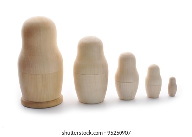 Set Of Unpainted Nested Russian Dolls On White