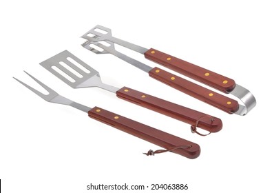 Set Of Used Barbecue Tools Isolated Over White Background