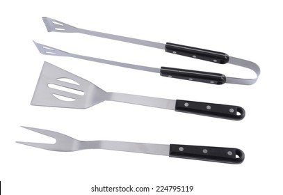 Set of used barbecue tools isolated over white background