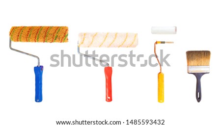 Set of used painting and decorating tools, isolated on white background. On white bg. Brush and paint-rollers. 