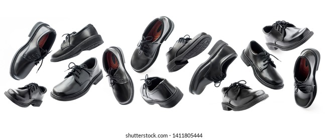 Set of variations of foreshortenings black leather shoes in perspective isolated on white background. Flying of objects. Concept levitation in air