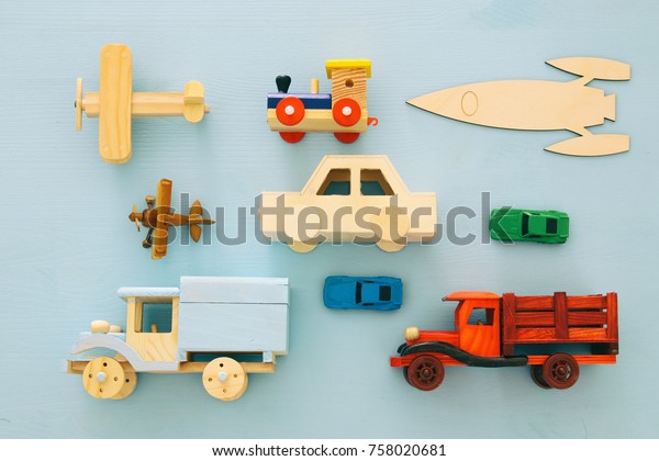 Set of\
various cars and airplanes toys. Top view\
image