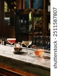 Set of various cocktails on bar counter. Assortment of alcoholic cocktails on restaurant bar