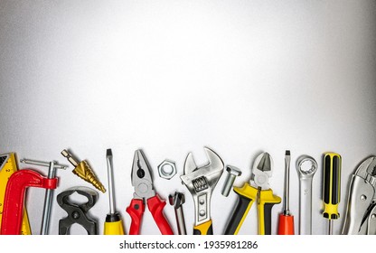 set of various hand work tools for construction and renovation job on metal desk. top view, copy space - Shutterstock ID 1935981286