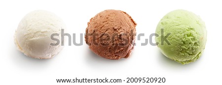 Set of various ice cream scoops or balls isolated on white background, top view. Vanilla, chocolate, pistachio flavour