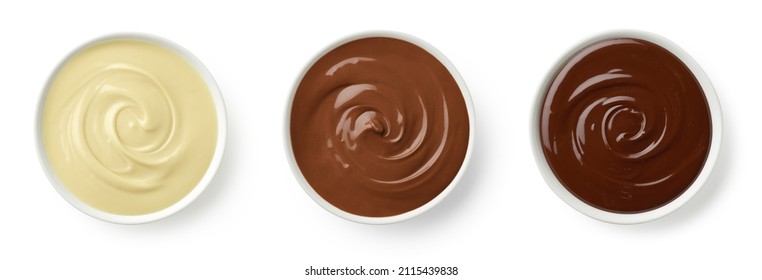 Set of various melted chocolate bowls (dark, milk and white) isolated on white background, top view