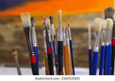 Set of various Paint brush with bright color painting in background.  - Powered by Shutterstock
