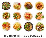 set of various plates of food isolated on a white background, top view