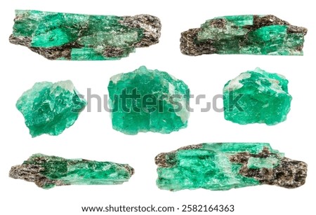 set of various samples of raw emerald minerals isolated on white background