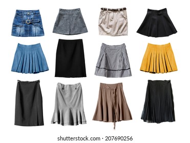 Set of various skirts on white background