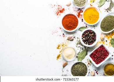 Set of various spices in a bowls on white background. Top view copy space. - Shutterstock ID 715363177