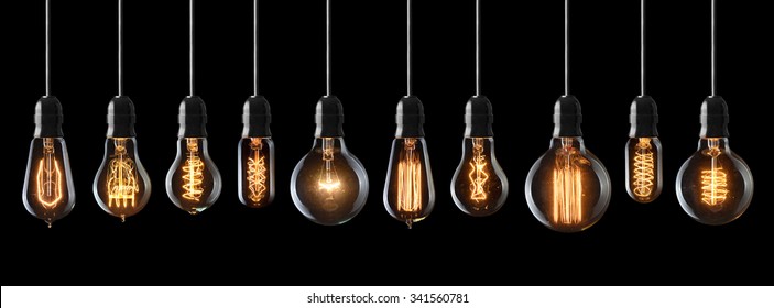 Set of vintage glowing light bulbs on black background - Shutterstock ID 341560781