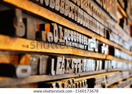 Set of vintage old print wooden letters in typography. Lettering, typography, graphic design concept. Single letters. Abstract background for your ideas.