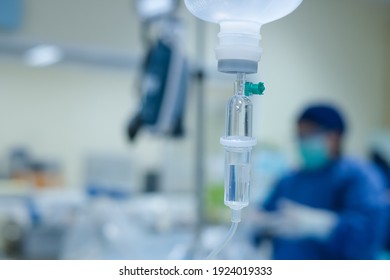 Set vitamin iv fluid intravenous drop saline drip hospital room Medical Concept treatment emergency and injection drug infusion care chemotherapy concept.blue light background selective focus