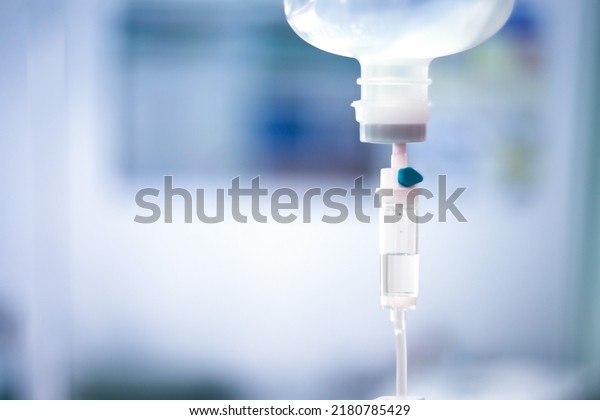 Set vitamin iv fluid intravenous drop saline drip\
hospital room Medical Concept treatment emergency and injection\
drug infusion care chemotherapy  concept.blue light background\
selective focus