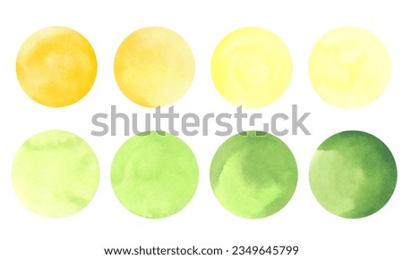 A set of watercolor circles, spots of yellow and green with a gradient isolated on a white background. Hand-drawn. The texture of watercolor on paper. An element for design and decoration.