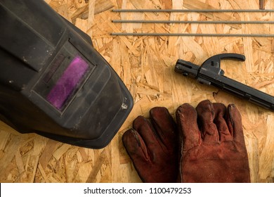 Set Of  Welder Tools On Wood Background . Flat Lay Tools Working Space For Welder , Top View