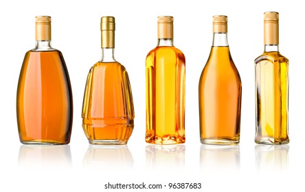 Set Of Whiskey Bottles Isolated On White Background