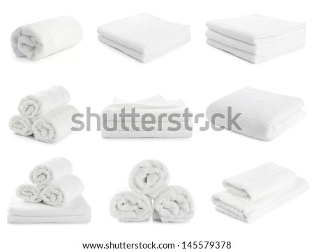 set of white beach towels isolated on  white background