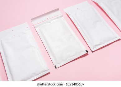 Set of white paper bubble envelopes for postal shipping