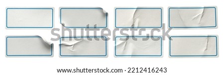 A set of white rectangular paper sticker label isolated on white background.