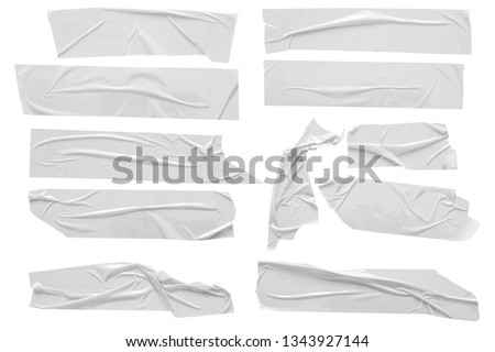 Set of white scotch tapes on white background. Torn horizontal and different size white sticky tape, adhesive pieces.