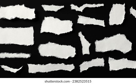 Set of white torn or ripped paper sheet on Black background with texture edges