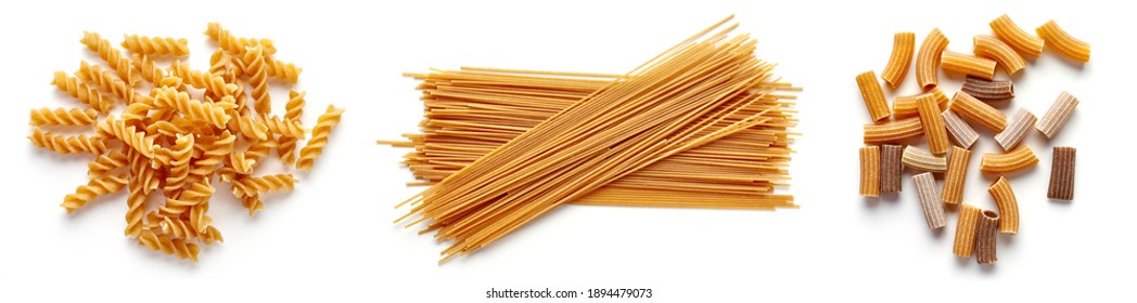Set of whole gran pasta - spiral fusilli, spaghetti, macherroni pasta isolated on white background, top view
