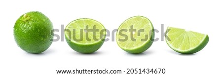 Set of whole and half slice of green lime fruit isolated on white background.
