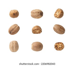 Set of whole and halved nutmeg seeds cutout. Organic muscat seeds variety isolated on a white background. Spice concept. Dry fruits of Myristica fragrans tree for herbal medicine and cooking. Top view