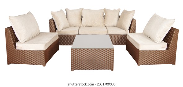 Set of wicker rattan furniture for the garden or terrace. comfortable sofa and two armchairs with soft pillows and a coffee table. - Shutterstock ID 2001709385
