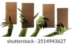 Set of witches hands holding cardboard boxes for copy space. The hand color is green. Evil, zombie, or monster hand isolated over a white background. Halloween concept