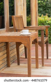 The Set Of Wood Furniture In The Garden,small Outdoor Cafe In Tropical Garden