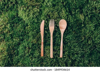 Set Of Wooden Cutlery On White Background