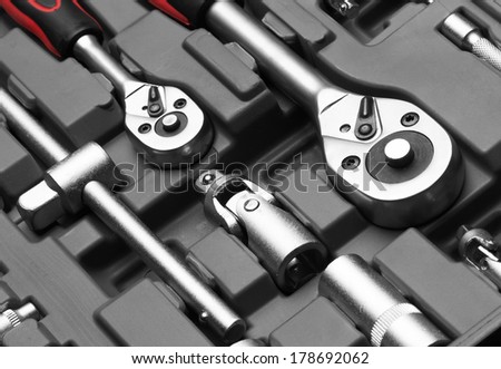 Set of wrenches on box