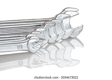 A set of wrenches from small to large size, selective focus, close-up, isolated on a white background