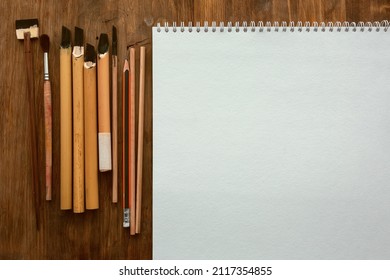 A Set Of Writing Utensils With Blank Paper Sheet. Traditional Arabic Calligraphy. Top View