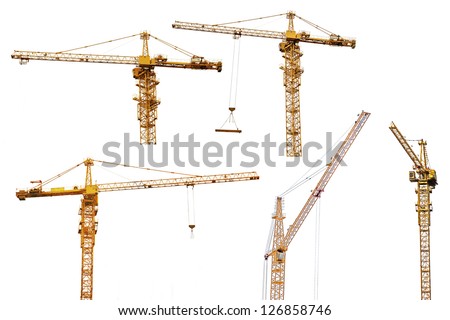 set of yellow hoisting cranes isolate on white background