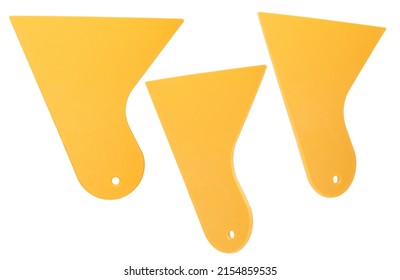 Set Of Yellow Plastic Scraper Isolated On White Background