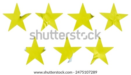 A set of yellow star shape paper sticker label isolated on white background.