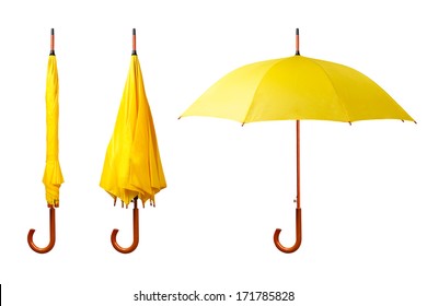 Set of yellow umbrellas isolated on white background. Opened and folded umbrellas on white