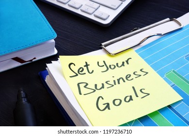 Set your business goals. Stack of financial documents. - Shutterstock ID 1197236710