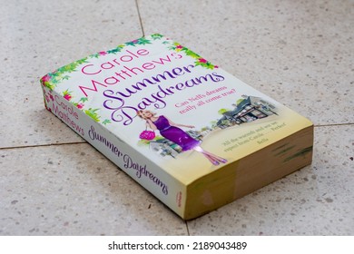 Setif, Algeria - August 11, 2022: Close Up Carole Matthews's Summer Daydreams Romance Novel On The Floor.