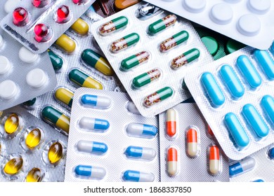 Sets of pills of different colour, size and shape. Medicine, treatment, pharmacy concept.