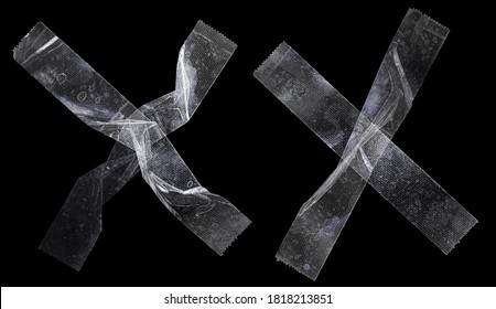 sets of transparent sticky tapes forming the letter x or overlapping each other on black background, crumpled plastic snips, poster design overlays or elements.